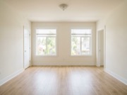 Move-in photo of the empty living room