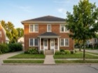 3814 42nd Ave S, a two story red brick duplex