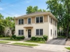2247 Bloomington Ave S, a cream two story fourplex